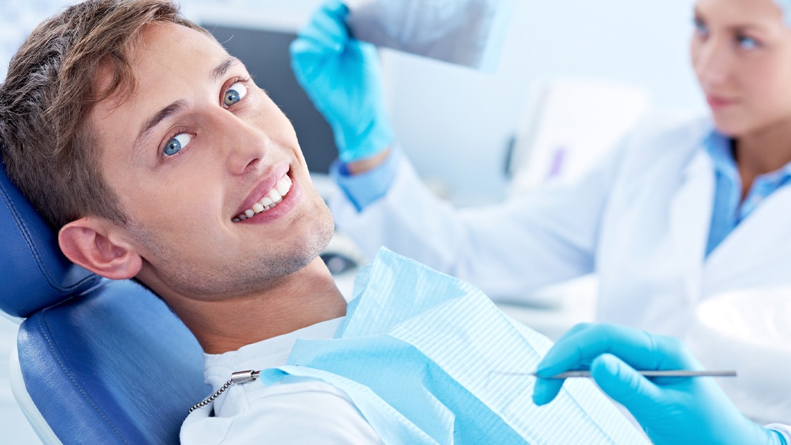 Man With Blue Eyes At The Dentist